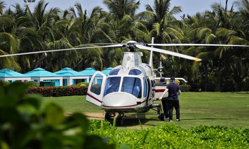 A helicopter of China General Aviation Co., Ltd. gets ready for an aerial tour in Sanya, south China's Hainan Province, March 21, 2024.(Xinhua/Zhou Huimin)