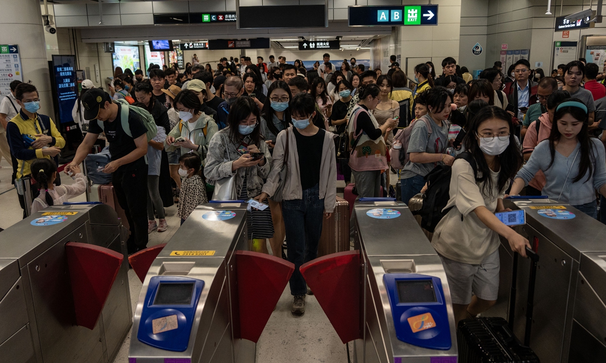 People are standing at the gate inside an MTR station in Hong Kong on May 1, 2024.Photo:VCG