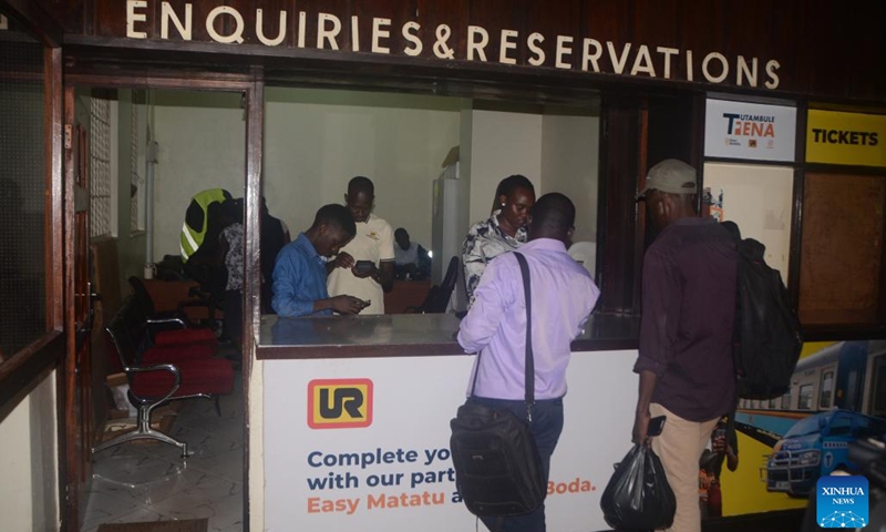 Passengers buy tickets at a train station in Kampala, Uganda, May 2, 2024. (Photo: Xinhua)