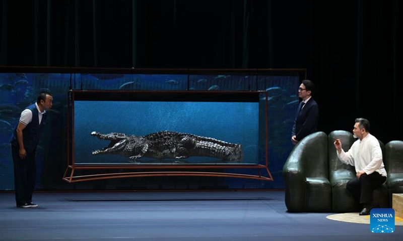 This photo taken on May 3, 2024 shows a scene during the debut of drama Crocodile in Suzhou, east China's Jiangsu Province. Crocodile, a new drama by Mo Yan, a winner of Nobel Prize for Literature, made its debut here on Friday. (Xinhua/Jin Liangkuai)