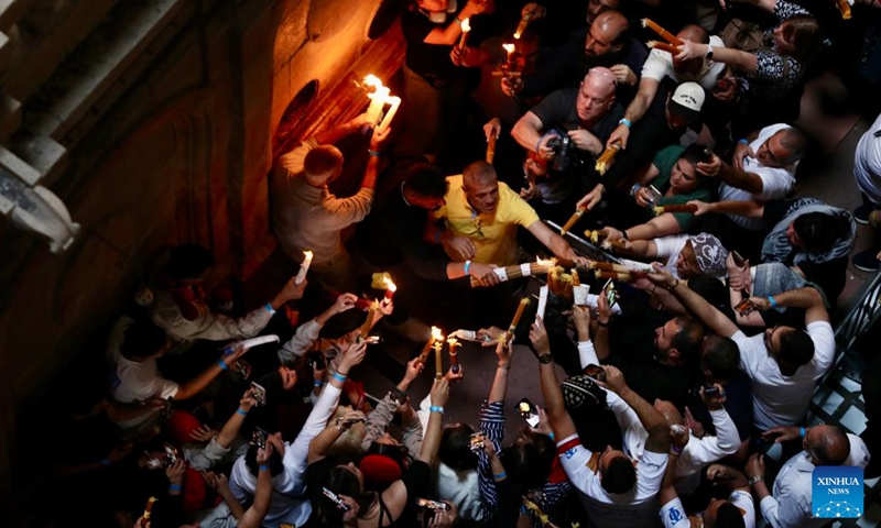 Orthodox Christian worshipers attend the Holy Fire ceremony at the Church of the Holy Sepulchre in Jerusalem's Old City, on May 4, 2024. Photo: Xinhua