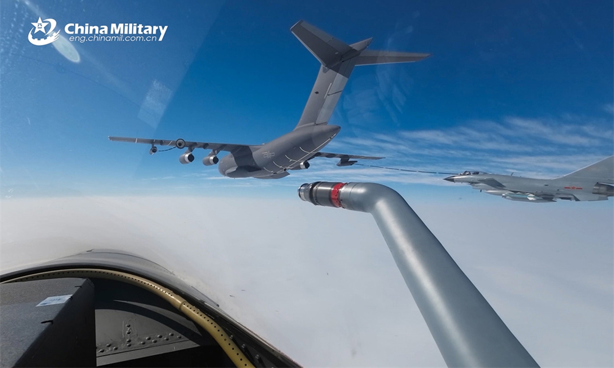 Two J-10 fighter jets attached to an aviation brigade with the air force under the PLA Southern Theater Command approach a YY-20 tanker for refueling during a flight training exercise in April, 2024. (eng.chinamil.com.cn/ Photo by Zhang Hengping)