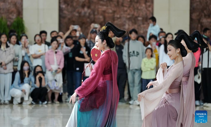 People watch a flash mob performance at the Liaoning Museum in Shenyang, northeast China's Liaoning Province, May 4, 2024. Traffics have surged at tourist attractions throughout the country during the 5-day May Day holiday beginning on May 1. Photo: Xinhua