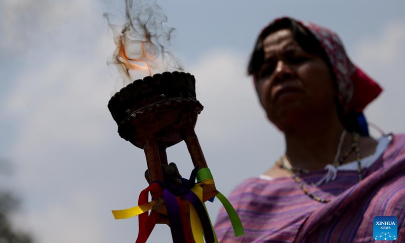 A woman participates in a rain petition ceremony at the Cuicuilco archaeological zone, in Mexico City, Mexico, on May 3, 2024. Photo: Xinhua