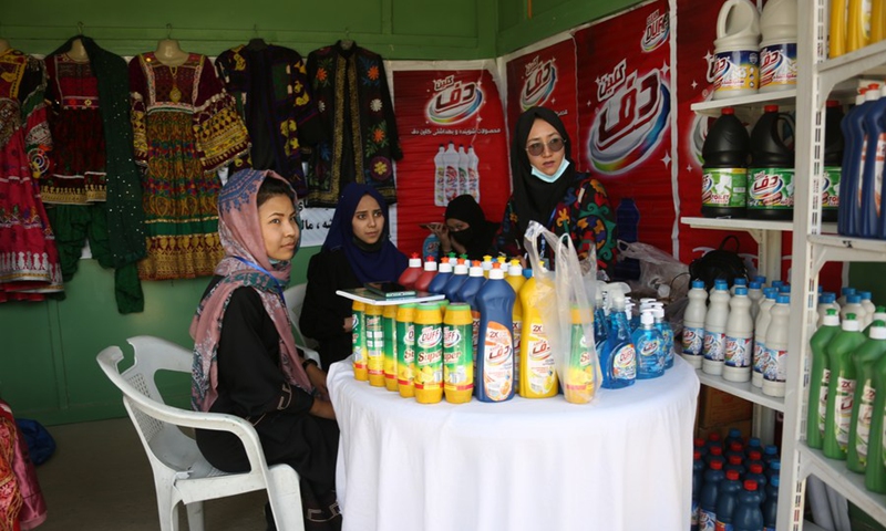 Women sell goods at an exhibition of agricultural products and other Afghan commodities in Kabul, the capital of Afghanistan, May 1, 2024. Photo: Xinhua