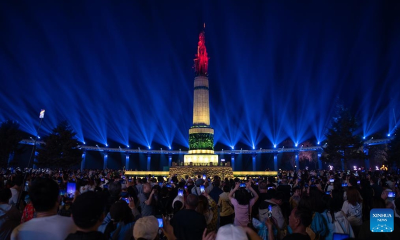 People watch a light show held at a square in Harbin, capital of northeast China's Heilongjiang Province, May 3, 2024. Photo: Xinhua