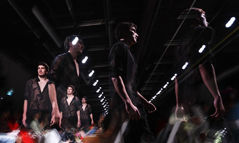 This multiple-exposure photo taken on May 3, 2024 shows a model presenting a creation at the 2024 Fashion Art Toronto's Fashion Week in Toronto, Canada. The annual fashion show is held here from May 2 to 5 this year. Photo: Xinhua