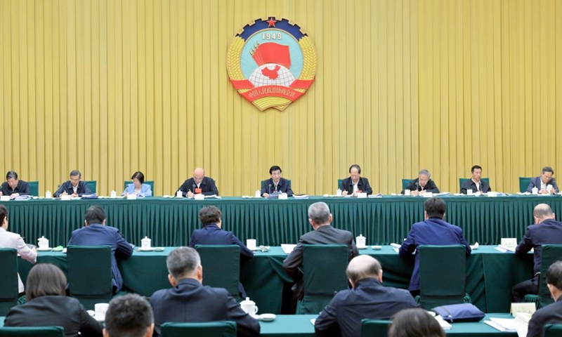 Wang Huning, a member of the Standing Committee of the Political Bureau of the Communist Party of China Central Committee and chairman of the National Committee of the Chinese People's Political Consultative Conference, speaks at a consultation session on promoting the high-quality development of population to underpin Chinese modernization in Beijing, capital of China, May 11, 2024. Photo: Xinhua