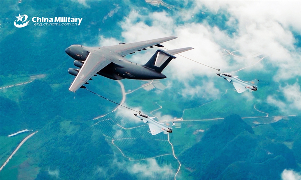 Two J-10 fighter jets attached to an aviation brigade with the air force under the PLA Southern Theater Command approach a YY-20 tanker for refueling during a flight training exercise in April, 2024. (eng.chinamil.com.cn/ Photo by Zhang Hengping)