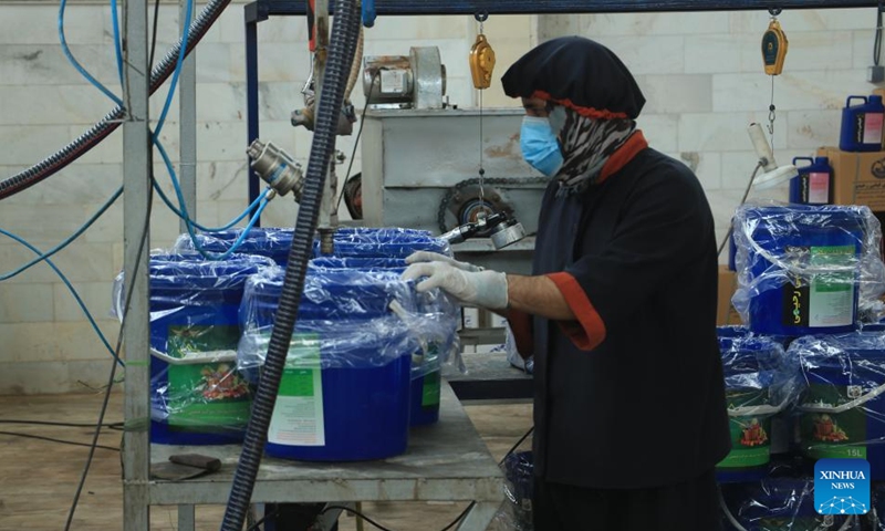 A worker operates at a fertilizer plant in Herat Province, west Afghanistan, May 2, 2024. The first private fertilizer plant in Afghanistan opened on Thursday in the country's west Herat province, plant manager Abdullah Norzai said Friday. Photo: Xinhua