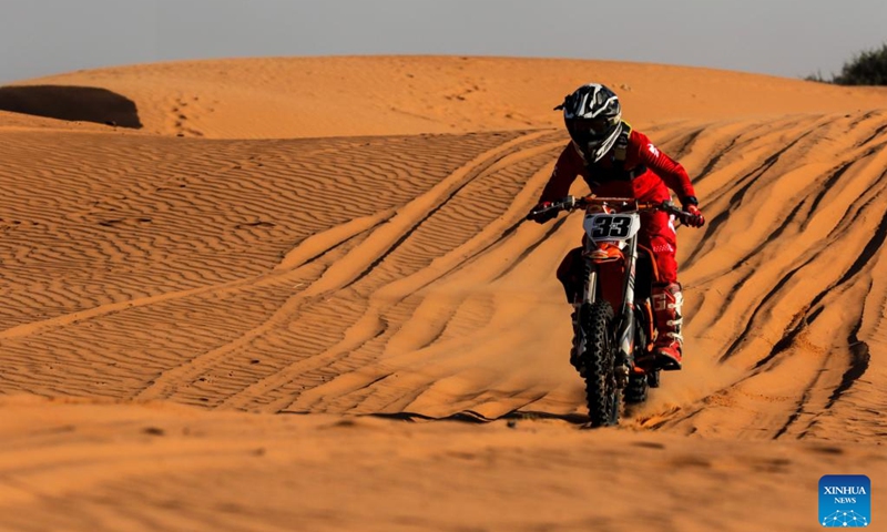 A biker competes on a motorcycle circuit race during the 2024 Khawa Dune Challenge and Cultural Festival in Khawa Village of Kgalagadi District, about 700 kilometers southwest of Botswana's capital city Gaborone, on May 4, 2024. Photo: Xinhua