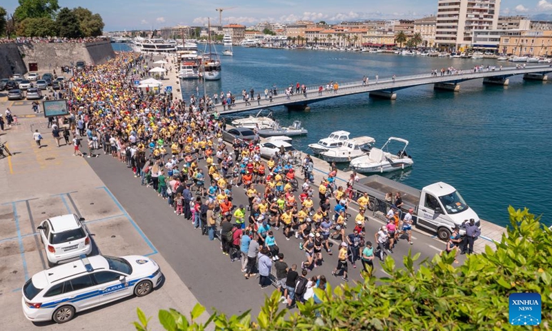 People participate in the 11th Wings for Life World Run 2024 in Zadar, Croatia, on May 5, 2024. Photo: Xinhua