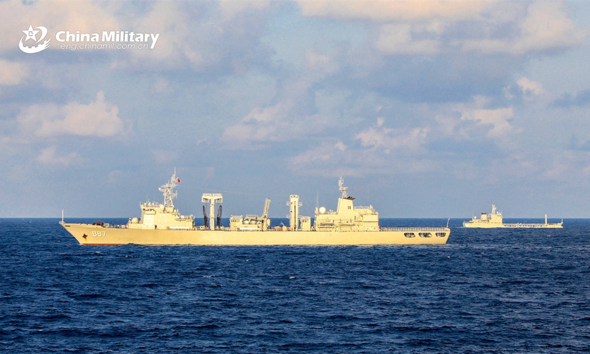 Warships attached to a service ship group of the PLA Navy sail in formation during a combat training exercise in late March, 2024. (eng.chinamil.com.cn/Photo by Wu Huanqing)