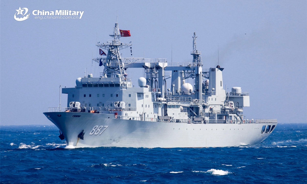 The comprehensive supply ship Weishanhu (Hull 887) attached to a service ship group of the PLA Navy sails on the sea during a combat training exercise in late March, 2024. (eng.chinamil.com.cn/Photo by Wu Huanqing)