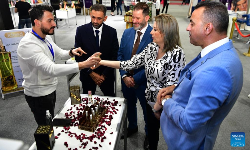 People visit the fourth Syrian International Chemical Industries Exhibition (ChemExpo 2024) in Damascus, Syria, May 5, 2024. The expo features over 80 Syrian and foreign companies, showcasing diverse products including pharmaceuticals, cosmetics and petrochemicals. Photo: Xinhua