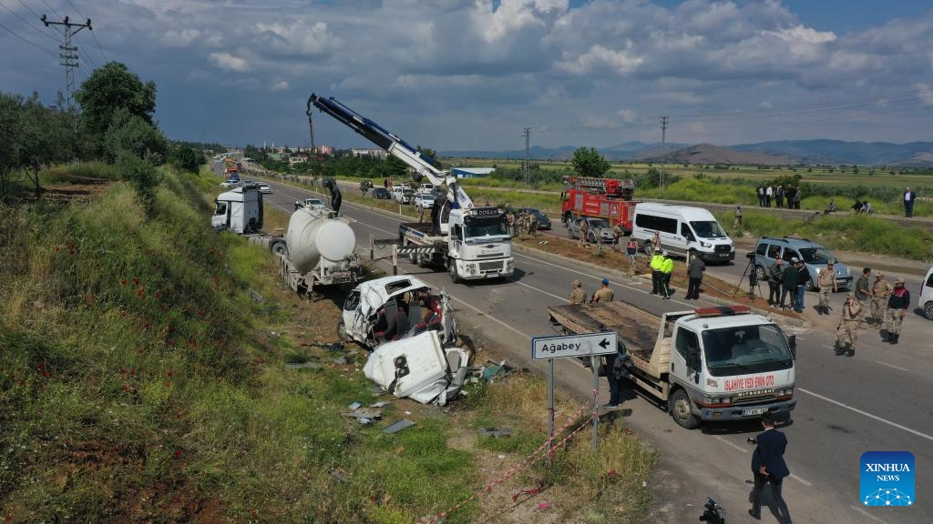 Rescuers work at the site where a minibus and a concrete mixer collided in the Islahiye district, Gaziantep province, southern Türkiye, on May 6, 2024. At least 8 people were killed and 11 others injured on Monday in the collision between a minibus and a concrete mixer in the Islahiye district.(Photo: Xinhua)