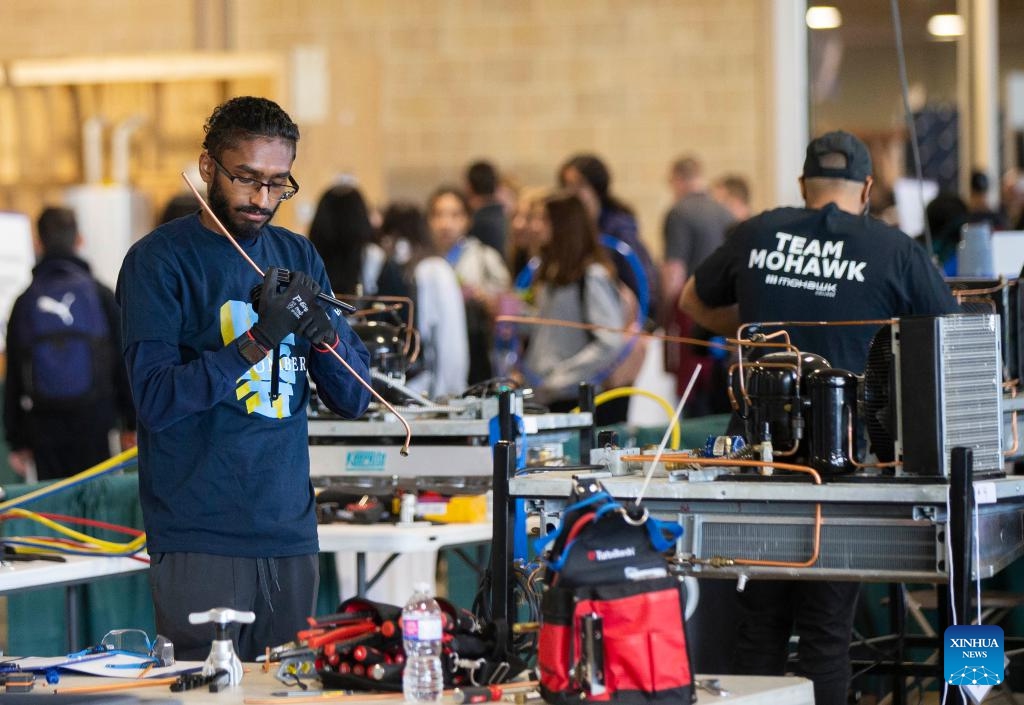 A student competes during the refrigeration contest of the 2024 Skills Ontario Competition in Toronto, Ontario, Canada, on May 6, 2024. The 2024 Skills Ontario Competition kicked off here on Monday, attracting more than 2,800 competitors. A broad range of skills and careers are represented during the three-day competition from the manufacturing, construction, service, and technology sectors.(Photo: Xinhua)