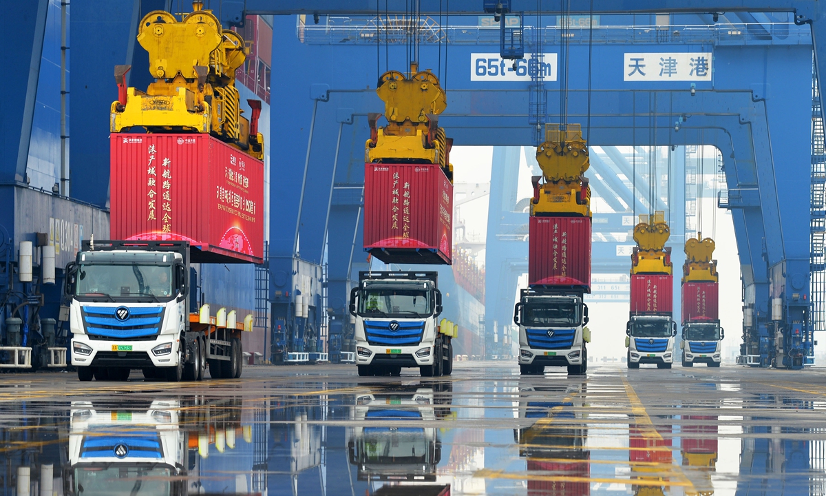Freight trucks work busily at Tianjin Port in North China's Tianjin Municipality, as the port launches its first direct shipping route to the east coast of South America in the Beijing-Tianjin-Hebei region on May 6, 2024. Photo: VCG
