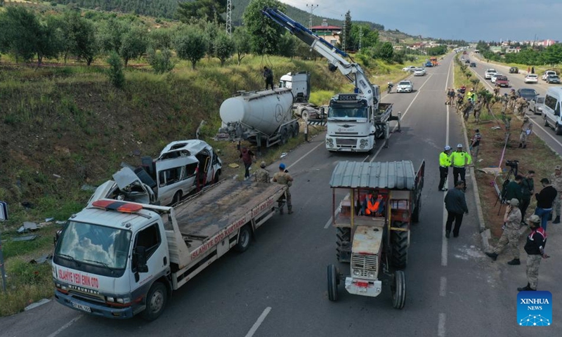 Rescuers work at the site where a minibus and a concrete mixer collided in the Islahiye district, Gaziantep province, southern Türkiye, on May 6, 2024. At least 8 people were killed and 11 others injured on Monday in the collision between a minibus and a concrete mixer in the Islahiye district.(Photo: Xinhua)