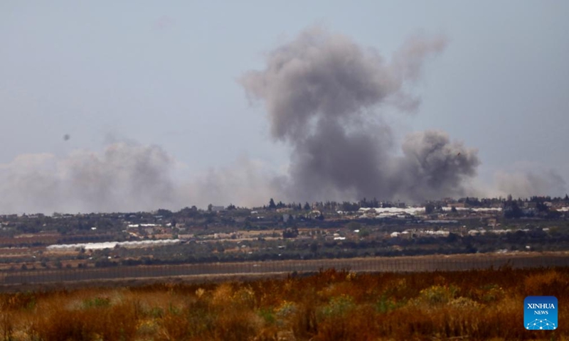 Smoke rises after an Israeli strike in southern Gaza Strip seen from near the Shalom Kerem crossing, on May 6, 2024. Israeli media reported on Monday that Israel's war cabinet has approved the launch of a ground offensive on Rafah that would take place after the civil population is evacuated.(Photo: Xinhua)