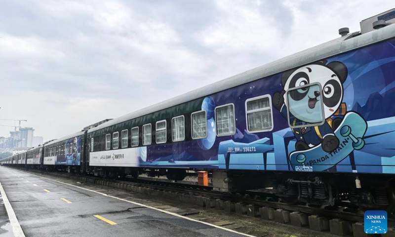 A Panda Train is seen in Guiyang, capital of southwest China's Guizhou Province, May 7, 2024. A tourist train, decorated with images, paintings and mascots of the panda and named as Panda Train, linking Guiyang, Xishuangbanna and Laos, will depart from Guiyang on May 8.(Photo: Xinhua)