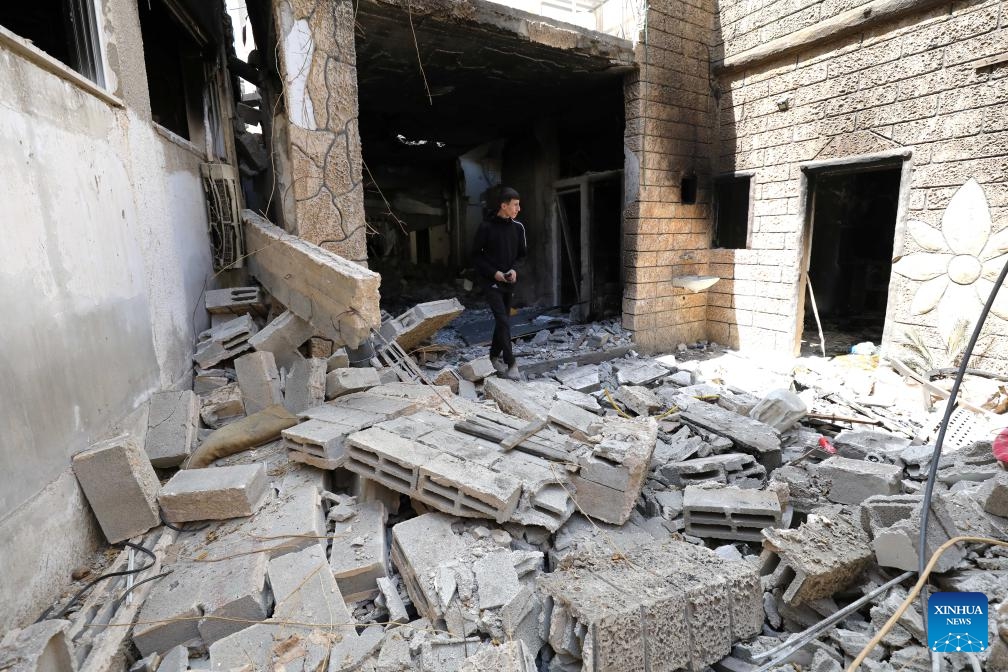A Palestinian inspects a destroyed house after an Israeli military operation in the city of Tulkarm in the northern West Bank, on May 7, 2024.(Photo: Xinhua)