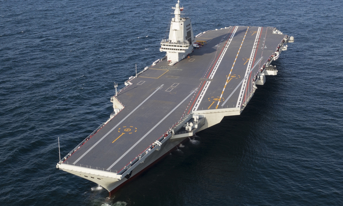 An aerial drone photo shows China’s third aircraft carrier, the Fujian, during its maiden sea trials.The Fujian returned to Shanghai Jiangnan Shipyard on May 8, 2024 after completing its maiden sea trials. Photo: Xinhua