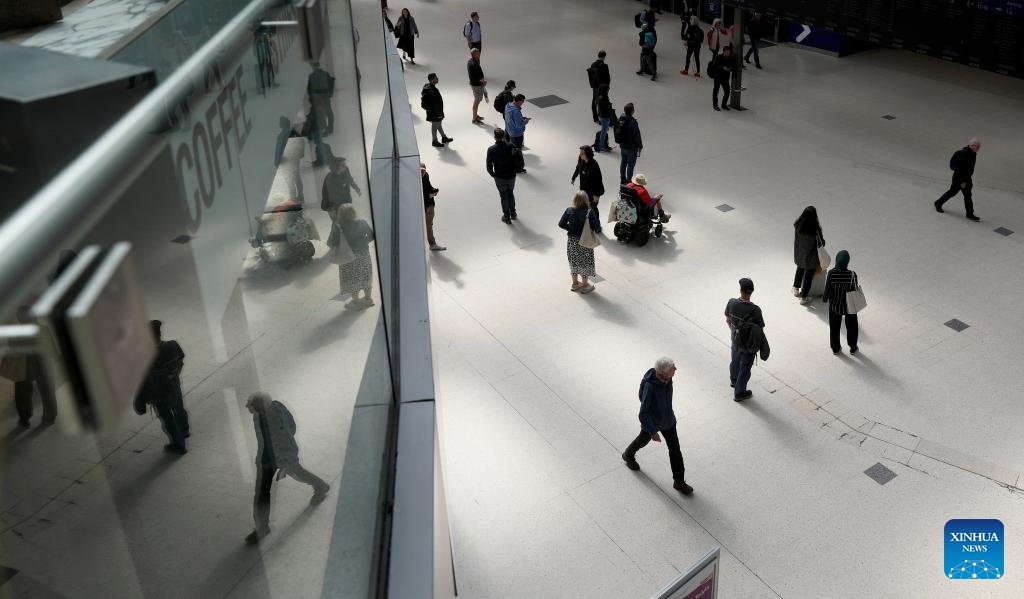 People are seen at Waterloo Station in London, Britain, on May 8, 2024. Train drivers in Britain went on a fresh wave of strikes and overtime bans, disrupting rail travel this week.(Photo: Xinhua)
