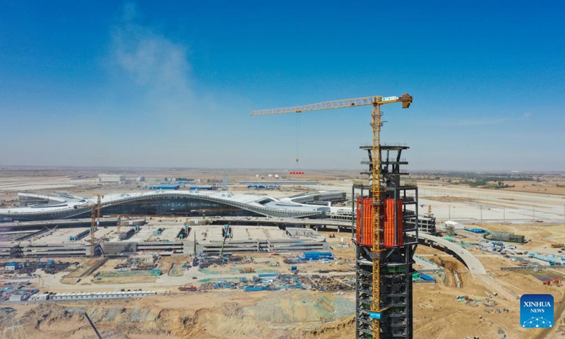 An aerial drone photo taken on May 8, 2024 shows the construction site of an air traffic control tower in Hohhot, north China's Inner Mongolia Autonomous Region. The capping of the main structure of an air traffic control tower of a new airport in Hohhot has been completed on Wednesday.(Photo: Xinhua)