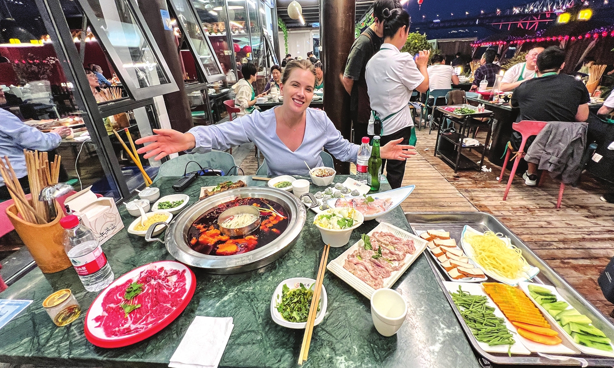Canadian travel vlogger Alina Mcleod enjoys hotpot in Chengdu, Southwest China's Sichuan Province. Photo: Courtesy of Mcleod