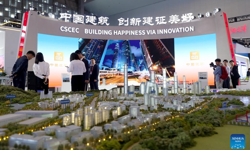 People visit the booth of CSCEC during the 2024 China Brand Day events in Shanghai, east China, May 10, 2024. The launching ceremony of 2024 China Brand Day was held here on Friday. An exposition on brand development as part of the ongoing 2024 China Brand Day events is ongoing. (Xinhua/Fang Zhe)