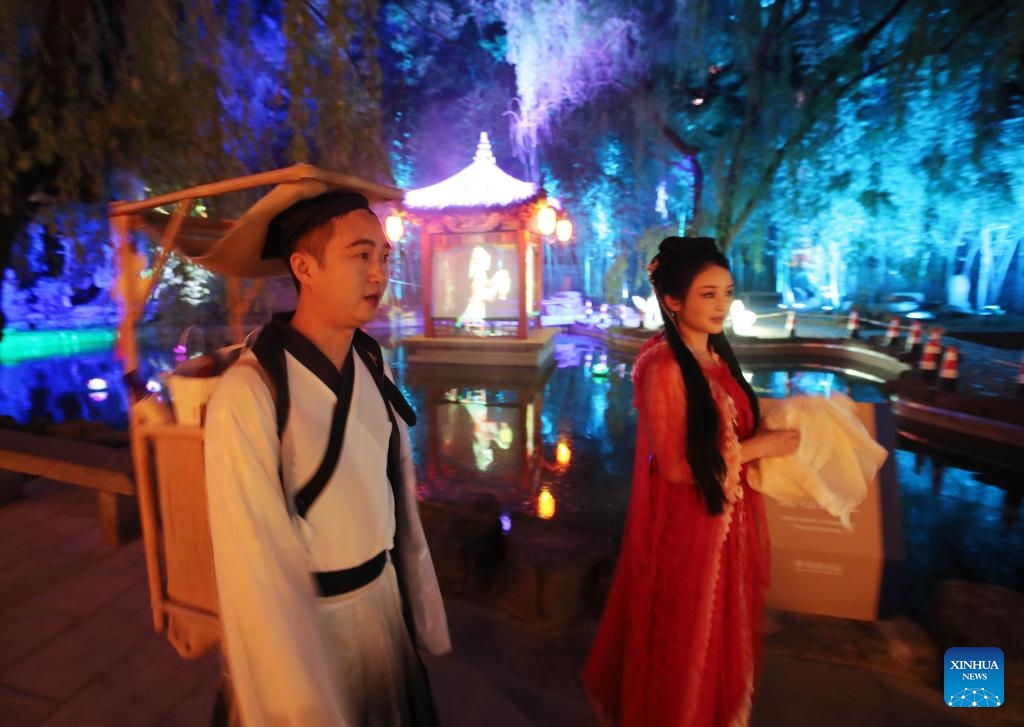 Tourists wearing Liaozhai themed costumes visit Liaozhaiyuan, a themed park in Zichuan District of Zibo City in east China's Shandong Province, May 8, 2024. The park, which is located in the hometown of the writer of Liaozhai Zhiyi (or Strange Stories from a Chinese Studio), has recently reopened after a renovations and renewal project, attracting visitors to experience the stories and characters of the famous Chinese fiction.(Photo: Xinhua)