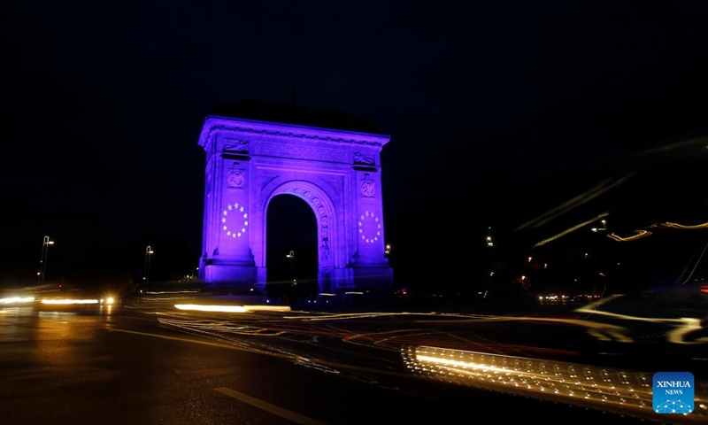 The Arch of Triumph is illuminated in European Union's flag colors to mark the Europe Day in Bucharest, Romania, on May 9, 2024.(Photo: Xinhua)