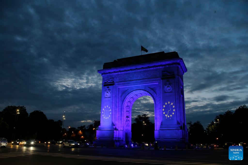 The Arch of Triumph is illuminated in European Union's flag colors to mark the Europe Day in Bucharest, Romania, on May 9, 2024.(Photo: Xinhua)