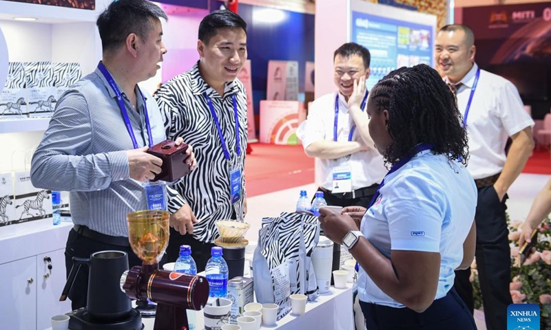 A coffee exhibitor shows coffee products during the China-Africa Economic and Trade Expo (CAETE) in Africa (Kenya) 2024 in Nairobi, Kenya, May 9, 2024. The CAETE in Africa (Kenya) 2024 kicked off on Thursday in the Kenyan capital of Nairobi as trade and investment between the two sides continue to expand.