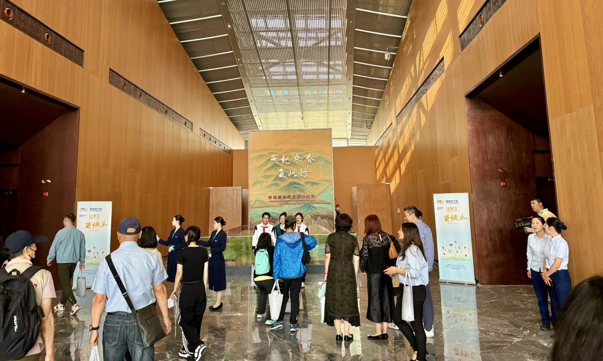 Visitors watch the exhibition on coordinated development of the Beijing-Tianjin-Hebei region at the Beijing Grand Canal Museum on Saturday. Photo: Dong Feng/GT 