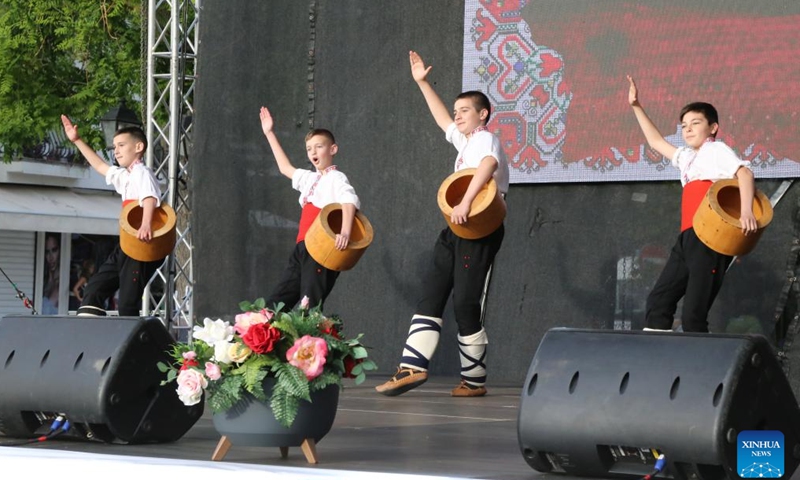 Boys offer folklore presentation at the opening event of Bulgaria's summer tourism season in Nessebar, Bulgaria, on May 17, 2024. The summer tourist season in Bulgaria officially opened on Friday. (Xinhua/Lin Hao)