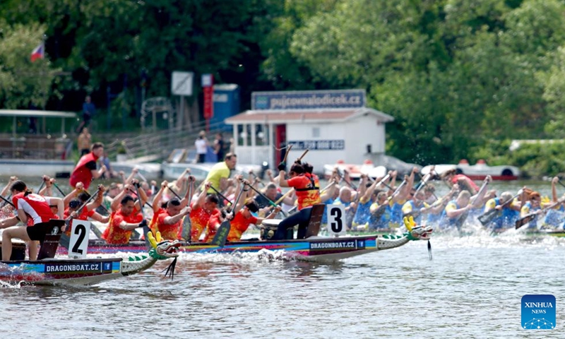 Participants race at the 27th Prague Dragon Boat Festival in Prague, the Czech Republic, on May 11, 2024. Photo: Xinhua
