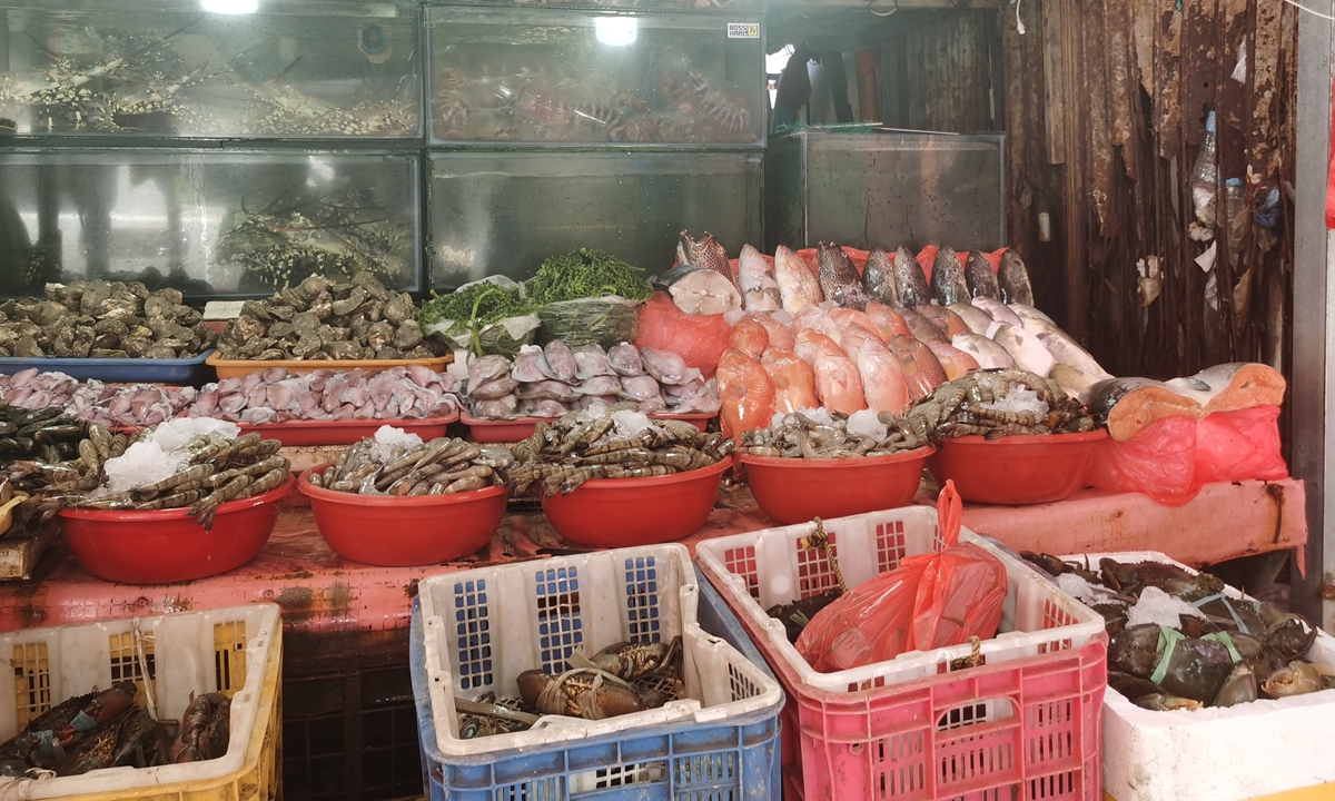 A vendor sells fish products partly getting from the South China Sea. Photo: Hu Yuwei/GT