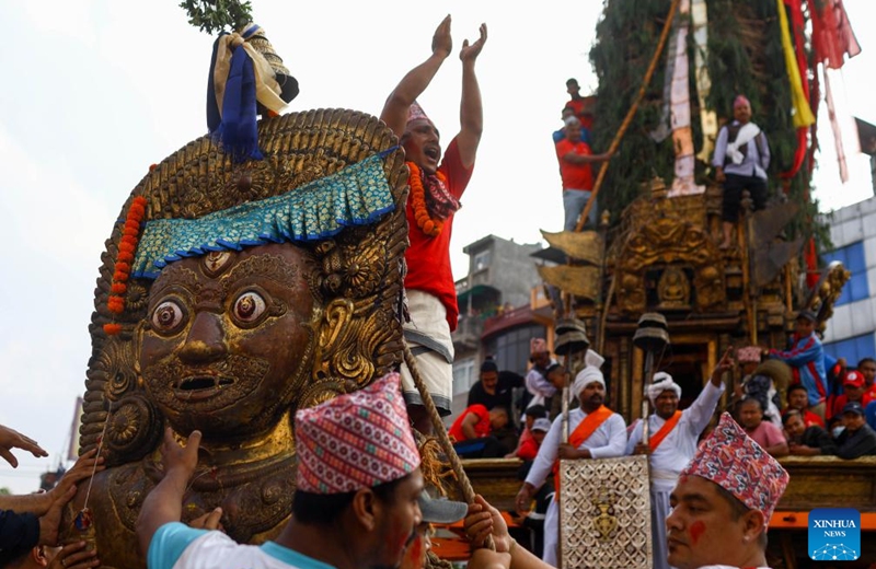 A chariot is seen during the celebration of Rato Machindranath festival in Lalitpur, Nepal, May 11, 2024. Local people worship Rato Machindranath, the god of rain, for a good harvest. Photo: Xinhua