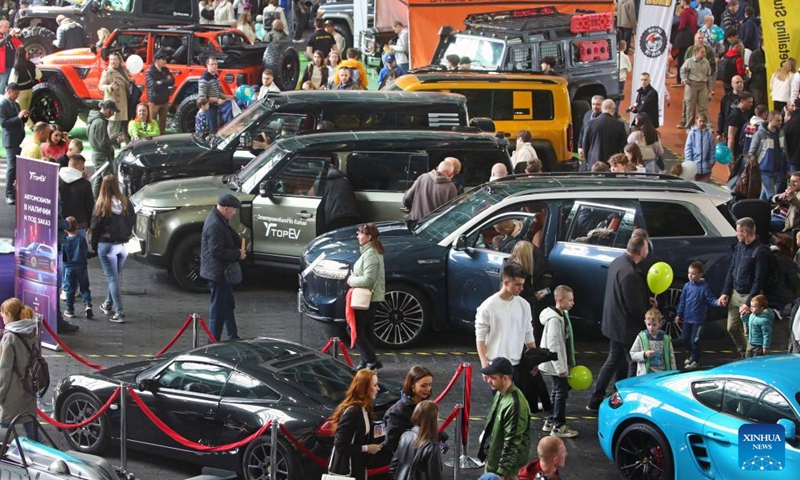 People visit an automotive exhibition in Minsk, Belarus, May 11, 2024. The two-day exhibition kicked off here on Saturday. Photo: Xinhua