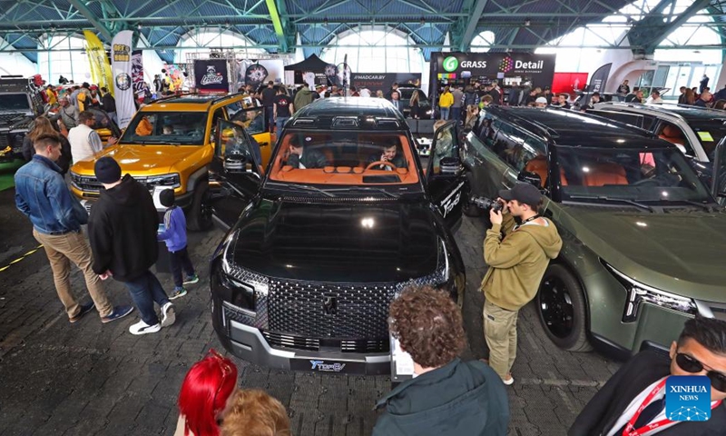 People visit an automotive exhibition in Minsk, Belarus, May 11, 2024. The two-day exhibition kicked off here on Saturday. Photo: Xinhua