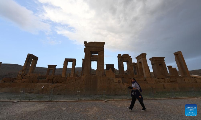 A tourist visits the ruins of Persepolis near the city of Shiraz in southern Iran, May 7, 2024. Persepolis, a UNESCO world heritage site, was the capital of the Achaemenid Empire of Persia (550-330 BC). The importance and quality of the monumental ruins make it a unique archaeological site.(Photo: Xinhua)