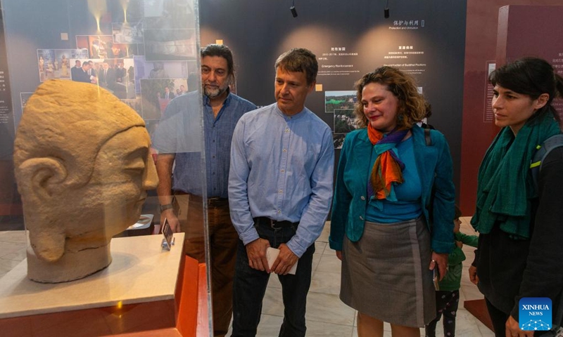 Visitors view an exhibit of Tianlong Mountain Grottoes at Zappeion Hall in Athens, Greece, May 11, 2024. The International Touring Exhibition of the Digital Restoration of the Tianlong Mountain Grottoes was held in Athens and attracted many visitors.(Photo: Xinhua)