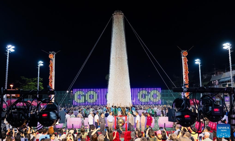 This photo taken on May 16, 2024 shows a gong-strike ceremony marking the start of a bun scrambling competition during the Bun Festival in Cheung Chau island, Hong Kong, south China. The Bun Festival, one of Hong Kong's most colorful cultural celebration events, has been on China's national list of intangible cultural heritage since 2011. For residents of Cheung Chau, this is an important annual event.(Photo: Xinhua)