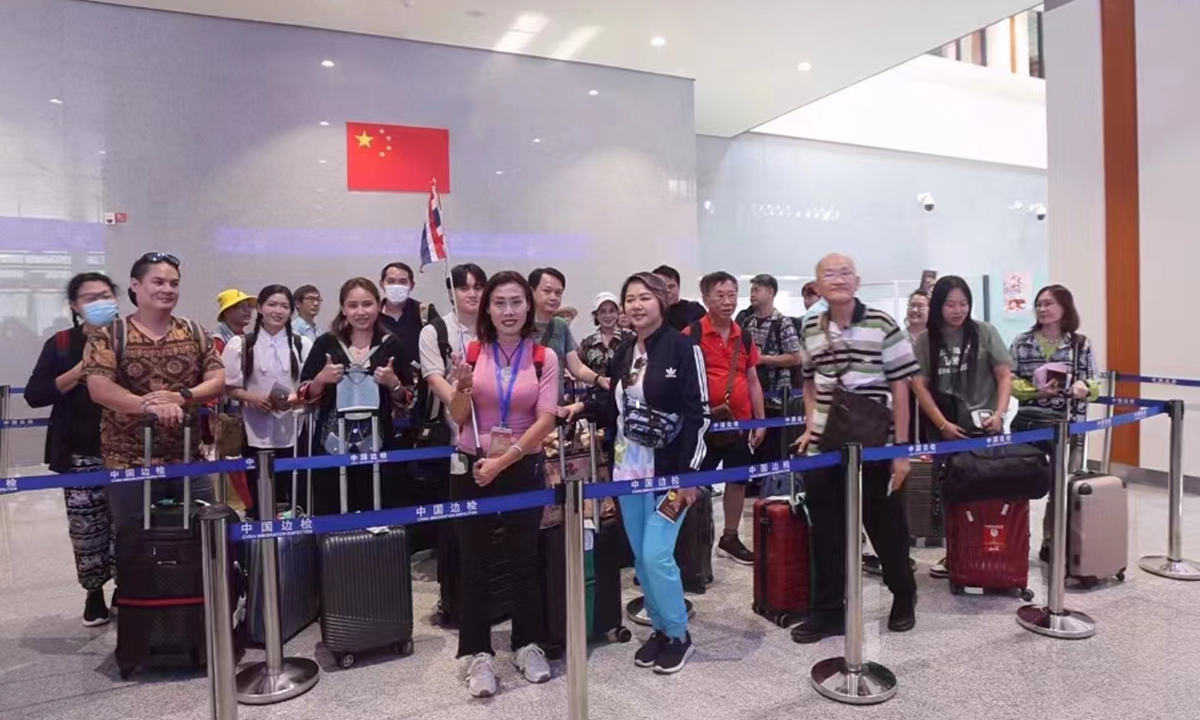 Tourists from Thailand pose for photos at the Mohan railway station of the China-Laos Railway in Southwest China's Yunnan Province. Photo: Border inspection station in Mohan
