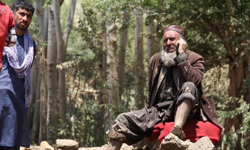 A man affected by flood rests at a safe area in Firoz Koh in west Afghanistan's Ghor province, May 18, 2024. At least 50 people have been killed, with 10 others missing, in the past 24 hours in west Afghanistan's Ghor Province, a local official said Saturday. Afghanistan has been experiencing heavy rains and floods in the past month, causing casualties and property damage. Photo: Xinhua