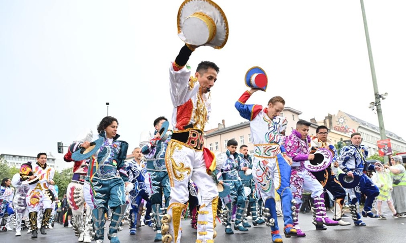 Revelers attend a parade during the Carnival of Cultures Festival in Berlin, Germany, May 19, 2024. Thousands of performers from nearly 60 teams participated in the parade on Sunday. Photo: Xinhua