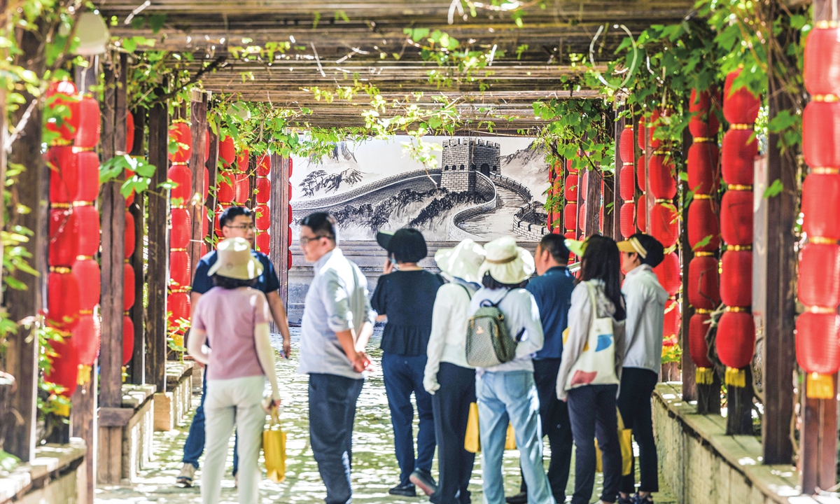 People visit Shixia village at the foot of the Badaling Great Wall on May 17, 2024. Photo: Li Hao/GT