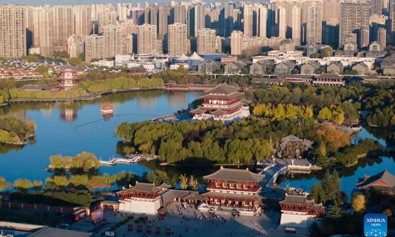 An aerial drone photo taken on Nov. 17, 2023 shows a view of the Tang Paradise, a complex based on the site of the original relic of an imperial garden dating back to the Tang Dynasty (618-907), in Xi'an, northwest China's Shaanxi Province. Xi'an, one of the ancient capitals in Chinese history, attracts a growing number of tourists in recent years.(Photo: Xinhua)